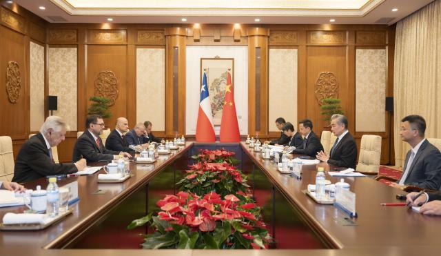 (260819) -- BEIJING, Aug. 19, 2026 (Xinhua) -- Chinese Foreign Minister Wang Yi, also a member of the Political Bureau of the Communist Party of China Central Committee, holds talks with Foreign Affairs Minister of Chile Francisco Perez Mackenna, in Beijing, capital of China, Aug. 19, 2026. (Xinhua/Cai Yang)