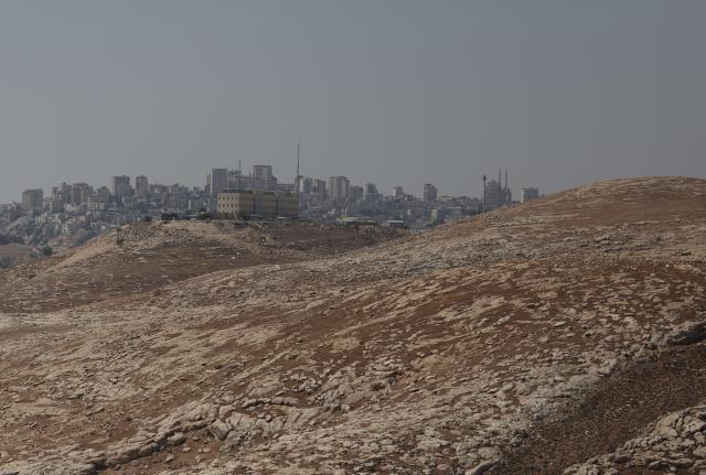 (260819) -- JERUSALEM, Aug. 19, 2026 (Xinhua) -- This photo taken on Aug. 19, 2026 shows a view of the E1 area in the West Bank near Jerusalem. Israel on Tuesday advanced plans for the controversial E1 settlement project in the West Bank, publishing a tender for 1,234 housing units.
  The tender, published online by the Ministry of Construction and Housing, covers part of a wider plan for 3,401 housing units in E1, an area east of Jerusalem. (Photo by Jamal Awad/Xinhua)