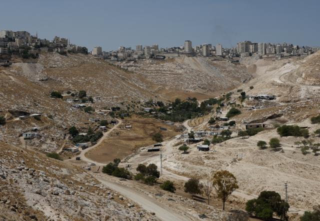 (260819) -- JERUSALEM, Aug. 19, 2026 (Xinhua) -- This photo taken on Aug. 19, 2026 shows a view of the E1 area in the West Bank near Jerusalem. Israel on Tuesday advanced plans for the controversial E1 settlement project in the West Bank, publishing a tender for 1,234 housing units.
  The tender, published online by the Ministry of Construction and Housing, covers part of a wider plan for 3,401 housing units in E1, an area east of Jerusalem. (Photo by Jamal Awad/Xinhua)