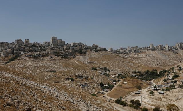 (260819) -- JERUSALEM, Aug. 19, 2026 (Xinhua) -- This photo taken on Aug. 19, 2026 shows a view of the E1 area in the West Bank near Jerusalem. Israel on Tuesday advanced plans for the controversial E1 settlement project in the West Bank, publishing a tender for 1,234 housing units.
  The tender, published online by the Ministry of Construction and Housing, covers part of a wider plan for 3,401 housing units in E1, an area east of Jerusalem. (Photo by Jamal Awad/Xinhua)
