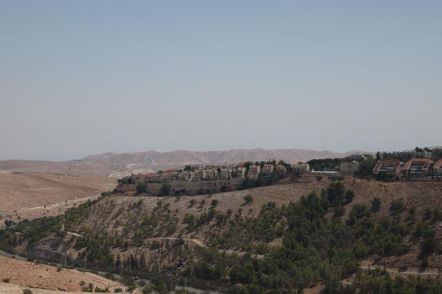 (260819) -- JERUSALEM, Aug. 19, 2026 (Xinhua) -- This photo taken on Aug. 19, 2026 shows a view of the E1 area in the West Bank near Jerusalem. Israel on Tuesday advanced plans for the controversial E1 settlement project in the West Bank, publishing a tender for 1,234 housing units.
  The tender, published online by the Ministry of Construction and Housing, covers part of a wider plan for 3,401 housing units in E1, an area east of Jerusalem. (Photo by Jamal Awad/Xinhua)