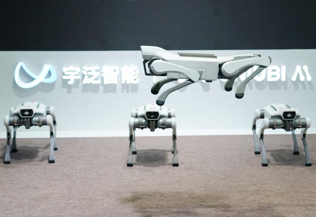 (260819) -- BEIJING, Aug. 19, 2026 (Xinhua) -- A robot demonstrates jumping ability during the 2026 World Robot Conference in Beijing, capital of China, Aug. 19, 2026. Themed "Human-Robot Symbiosis, Production-Demand Convergence," the 2026 edition of the conference kicked off here on Wednesday. (Xinhua/Zhang Chenlin)