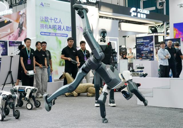 (260819) -- BEIJING, Aug. 19, 2026 (Xinhua) -- A robot performs during the 2026 World Robot Conference in Beijing, capital of China, Aug. 19, 2026. Themed "Human-Robot Symbiosis, Production-Demand Convergence," the 2026 edition of the conference kicked off here on Wednesday. (Xinhua/Zhang Chenlin)