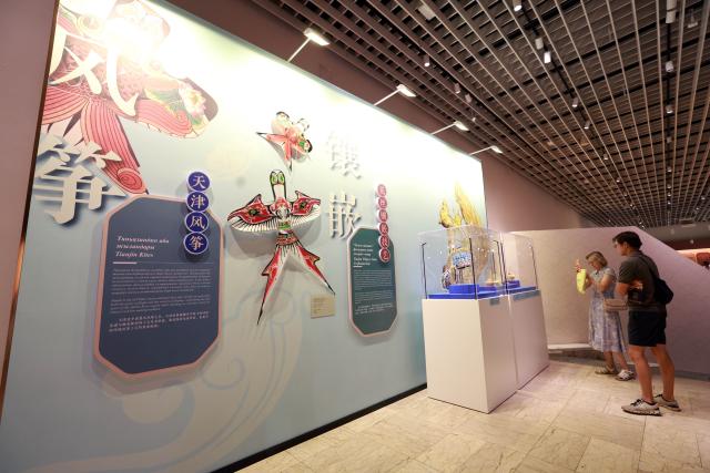 (260819) -- BISHKEK, Aug. 19, 2026 (Xinhua) -- People visit the exhibition "Harmony Creates Beauty: An Art Exhibition of Ancient Chinese Civilization" at the National History Museum of the Kyrgyz Republic in Bishkek, Kyrgyzstan, Aug. 18, 2026.
  The three-month exhibition, under the direction of China's National Cultural Heritage Administration, is jointly organized by the Tianjin Municipal Administration of Culture and Tourism, the Cultural Relics Bureau of the Inner Mongolia Autonomous Region, the Tianjin Museum, the Inner Mongolia Museum, the National History Museum of the Kyrgyz Republic, and the Chinese Cultural Center in Bishkek. (Photo by Roman Gainanov/Xinhua)