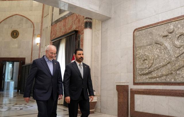 (260819) -- BAGHDAD, Aug. 19, 2026 (Xinhua) -- Iraqi Prime Minister Ali al-Zaidi (R) meets with visiting Iranian Parliament Speaker Mohammad Bagher Ghalibaf in Baghdad, Iraq, Aug. 19, 2026. (Iraqi Prime Minister Media Office/Handout via Xinhua)