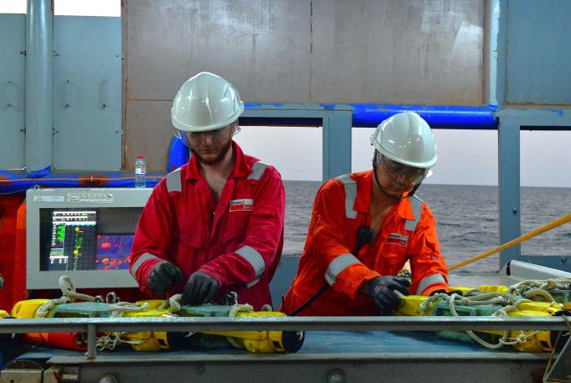 (260820) -- BAKU, Aug. 20, 2026 (Xinhua) -- Chinese and Azerbaijani technicians deploy yellow-cased Ocean Bottom Node (OBN) seismic instruments to the seabed aboard a seismic vessel of the Caspian Geophysical Company in the Caspian Sea near Baku, Azerbaijan, Aug. 18, 2026. Chinese and Azerbaijani oil-gas exploration technicians aboard the seismic vessel worked together to deploy OBN seismic instruments into the waters of the Caspian Sea, and conduct data analysis on Wednesday night.
   The vessel is operated by the Caspian Geophysical Company, a joint venture between China and Azerbaijan. (Xinhua/Chen Junfeng)