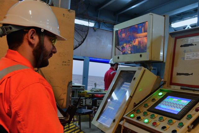 (260820) -- BAKU, Aug. 20, 2026 (Xinhua) -- An Azerbaijani employee operates equipment aboard a seismic vessel of Caspian Geophysical Company in the Caspian Sea near Baku, Azerbaijan, Aug. 18, 2026. Chinese and Azerbaijani oil-gas exploration technicians aboard the seismic vessel worked together to deploy OBN seismic instruments into the waters of the Caspian Sea, and conduct data analysis on Wednesday night.
   The vessel is operated by the Caspian Geophysical Company, a joint venture between China and Azerbaijan. (Xinhua/Chen Junfeng)