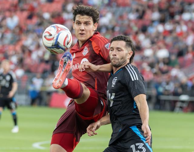 (260820) -- TORONTO, Aug. 20, 2026 (Xinhua) -- Markus Cimermancic (L) of Toronto FC vies with Brandt Bronico of Charlotte FC during the 2026 Major League Soccer (MLS) regular season match between Toronto FC and Charlotte FC at BMO Field in Toronto, Canada, on Aug. 19, 2026. (Photo by Zou Zheng/Xinhua)