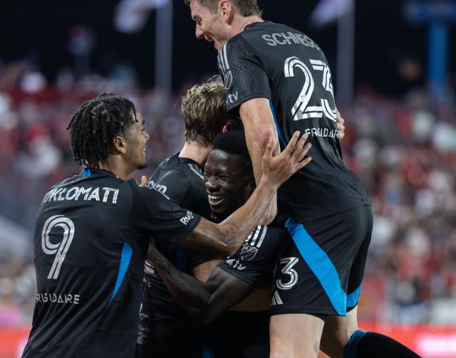 (260820) -- TORONTO, Aug. 20, 2026 (Xinhua) -- Players of Charlotte FC celebrate scoring during the 2026 Major League Soccer (MLS) regular season match between Toronto FC and Charlotte FC at BMO Field in Toronto, Canada, on Aug. 19, 2026. (Photo by Zou Zheng/Xinhua)