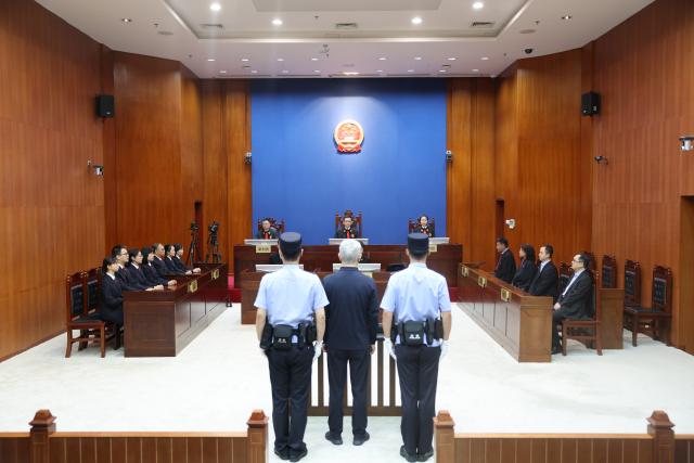 (260820) -- SHENZHEN, Aug. 20, 2026 (Xinhua) -- This photo taken on Aug. 20, 2026 shows a scene during a trial on Xu Jiayin, former boss of Evergrande Group, at the Shenzhen Intermediate People's Court in Shenzhen, south China's Guangdong Province. A Chinese court on Thursday sentenced Xu Jiayin, former boss of Evergrande Group, to life in prison after convicting him of multiple crimes.
   TO GO WITH "2nd LD-Writethru: China sentences former Evergrande boss to life in prison" (Shenzhen Intermediate People's Court/Handout via Xinhua)