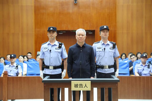 (260820) -- SHENZHEN, Aug. 20, 2026 (Xinhua) -- Xu Jiayin, former boss of Evergrande Group, stands trial at the Shenzhen Intermediate People's Court in Shenzhen, south China's Guangdong Province, Aug. 20, 2026. A Chinese court on Thursday sentenced Xu Jiayin, former boss of Evergrande Group, to life in prison after convicting him of multiple crimes.
   TO GO WITH "2nd LD-Writethru: China sentences former Evergrande boss to life in prison" (Shenzhen Intermediate People's Court/Handout via Xinhua)