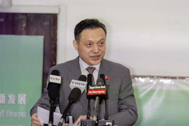 (260820) -- KATHMANDU, Aug. 20, 2026 (Xinhua) -- Zhang Maoming, Chinese Ambassador to Nepal, addresses a story-sharing forum titled "Xizang Panorama: New Era, New Development" in Kathmandu, Nepal, Aug. 19, 2026. The story-sharing forum was held here Wednesday, drawing more than 300 people from various sectors of China and Nepal. (Photo by Sulav Shrestha/Xinhua)