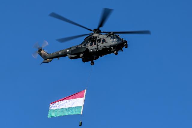 (260820) -- BUDAPEST, Aug. 20, 2026 (Xinhua) -- A Hungarian Air Force helicopter participates in a military air parade over the Danube in Budapest, Hungary, on Aug. 20, 2026. Hungary marks its national day on Thursday with traditional ceremonies, music concerts, and a redesigned evening spectacle in Budapest. (Photo by David Balogh/Xinhua)
