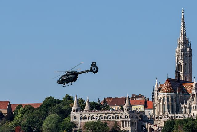 (260820) -- BUDAPEST, Aug. 20, 2026 (Xinhua) -- A Hungarian Air Force helicopter participates in a military air parade over the Danube in Budapest, Hungary, on Aug. 20, 2026. Hungary marks its national day on Thursday with traditional ceremonies, music concerts, and a redesigned evening spectacle in Budapest. (Photo by David Balogh/Xinhua)