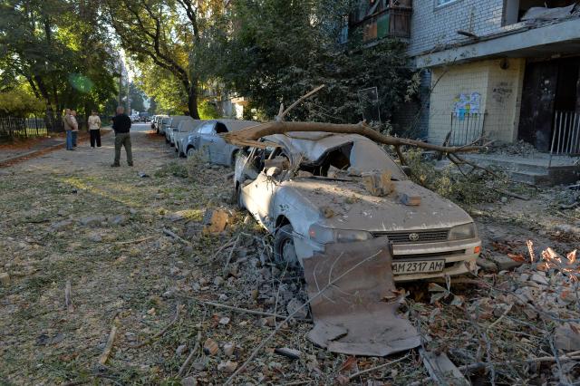 (260820) -- KIEV, Aug. 20, 2026 (Xinhua) -- Photo taken on Aug. 20, 2026 shows vehicles damaged in a Russian overnight missile and drone attack in Kiev, Ukraine. A Russian overnight missile and drone attack hits Kyiv, Ukraine, on August 20, 2026. (Photo by Peter Druk/Xinhua)