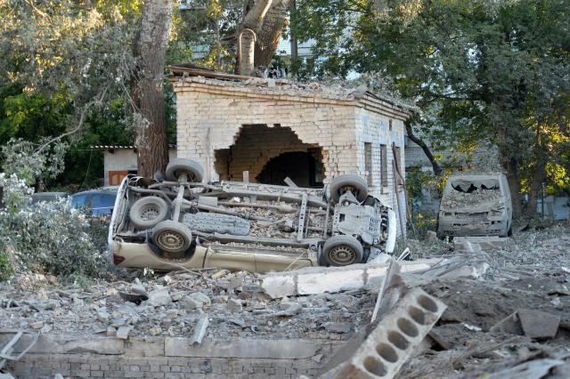 (260820) -- KIEV, Aug. 20, 2026 (Xinhua) -- Photo taken on Aug. 20, 2026 shows vehicles damaged in a Russian overnight missile and drone attack in Kiev, Ukraine. A Russian overnight missile and drone attack hits Kyiv, Ukraine, on August 20, 2026. (Photo by Peter Druk/Xinhua)