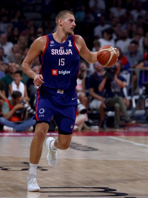 (260821) -- BELGRADE, Aug. 21, 2026 (Xinhua) -- Serbia's Nikola Jokic controls the ball during a friendly basketball match between Serbia and France in Belgrade, Serbia on August 20, 2026. (Photo by Djordje Kostic/Xinhua)
