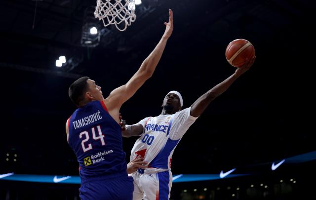 (260821) -- BELGRADE, Aug. 21, 2026 (Xinhua) -- France's Sylvian Francisco (R) vies with Serbia's Nikola Tanaskovic (L) during a friendly basketball match between Serbia and France in Belgrade, Serbia on August 20, 2026. (Photo by Djordje Kostic/Xinhua)