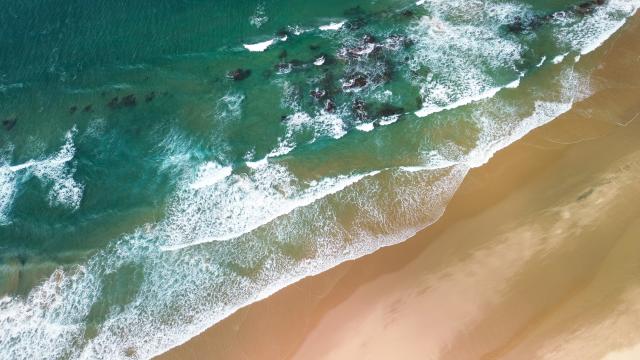 (260821) -- KWAZULU-NATAL, Aug. 21, 2026 (Xinhua) -- An aerial drone photo taken on Aug. 20, 2026 shows a view of Cape Vidal at iSimangaliso Wetland Park in KwaZulu-Natal Province, South Africa. Located in northern KwaZulu-Natal Province, the park features a rich diversity of ecosystems, including lakes, wetlands, beaches and coastal forests. It was inscribed on the UNESCO World Heritage List in 1999. (Xinhua/Chen Wei)