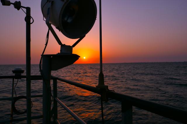(260821) -- BAKU, Aug. 21, 2026 (Xinhua) -- This photo taken on Aug. 19, 2026 shows a sunset view seen from a geophysical survey vessel of Caspian Geophysical Company, a China-Azerbaijan joint venture, in the Caspian Sea near Baku, Azerbaijan. (Xinhua/Chen Junfeng)