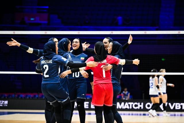 (260821) -- TIANJIN, Aug. 21, 2026 (Xinhua) -- Players of Iran celebrate after winning the pool A volleyball match between Iran and Chinese Taipei at the AVC Women's Volleyball Continental Championship in Tianjin, China, Aug. 21, 2026. (Xinhua/Zhao Zishuo)