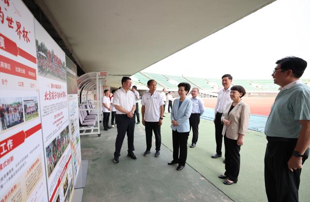 (260821) -- BEIJING, Aug. 21, 2026 (Xinhua) -- Chinese State Councilor Shen Yiqin visits the Beijing Youth Football Training Center in Beijing, capital of China, Aug. 20, 2026. Shen paid a visit to youth football facilities in Beijing on Thursday, where she focused on the development of the youth football system. (Xinhua/Cao Can)