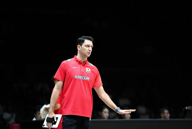 (260821) -- TIANJIN, Aug. 21, 2026 (Xinhua) -- Ferhat Akbas, head coach of Japan, reacts during the pool C match between Japan and China's Hong Kong at AVC Women's Volleyball Continental Championship in Tianjin, China, Aug. 21, 2026. (Xinhua/Sun Fanyue)