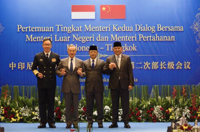 (260821) -- JAKARTA, Aug. 21, 2026 (Xinhua) -- The Second Ministerial Meeting of China-Indonesia Joint Foreign and Defense Ministerial Dialogue is held in Jakarta, Indonesia, Aug. 21, 2026. Chinese Foreign Minister Wang Yi and Defense Minister Dong Jun co-chaired the meeting with Indonesian Foreign Minister Sugiono and Defense Minister Sjafrie Sjamsoeddin. (Xinhua/Cen Yunpeng)