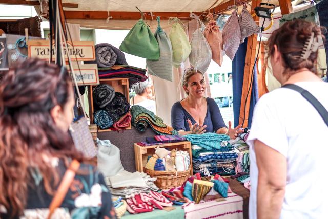 (260821) -- BUDAPEST, Aug. 21, 2026 (Xinhua) -- People visit the Festival of Folk Arts at Buda Castle in Budapest, Hungary, Aug. 21, 2026. The annual festival showcases traditional Hungarian crafts and folk art as part of the celebration of Hungarian cultural heritage. (Photo by David Balogh/Xinhua)