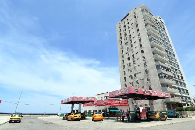 (260821) -- HAVANA, Aug. 21, 2026 (Xinhua) -- Taxis refuel at a gas station in Havana, capital of Cuba, on Aug. 21, 2026. Cuban Foreign Minister Bruno Rodriguez on Thursday denounced Washington's increased sanctions against Cuban officials and entities, accusing the United States of deliberately seeking to strangle the island's economy and undermining the government's ability to provide basic services. (Photo by Joaquin Hernandez/Xinhua)