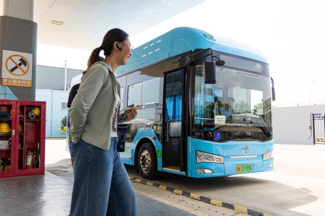 (260822) -- HEFEI, Aug. 22, 2026 (Xinhua) -- Visitors are about to board a hydrogen fuel cell-powered bus at the hydrogen refueling station of Anhui Mingtian Hydrogen Energy Technology Co., Ltd. in Lu'an, east China's Anhui Province, Aug. 7, 2026. (Xinhua/Zhao Jinzheng)