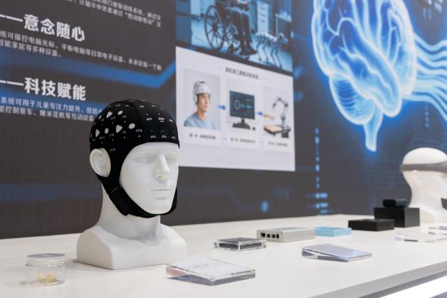 (260822) -- HEFEI, Aug. 22, 2026 (Xinhua) -- This photo taken on Aug. 8, 2026 shows a set of home-grown brain-computer interface (BCI) products displayed at the China Sensor Valley in Bengbu, east China's Anhui Province. (Xinhua/Zhao Jinzheng)