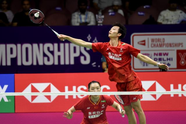 (260822) -- NEW DELHI, Aug. 22, 2026 (Xinhua) -- Jiang Zhenbang (top)/Wei Yaxin of China compete during the mixed doubles semifinal match between Jiang Zhenbang/Wei Yaxin of China and Thom Gicquel/Delphine Delrue of France at BWF World Championships in New Delhi, India, Aug. 22, 2026. (Photo by Javed Dar/Xinhua)