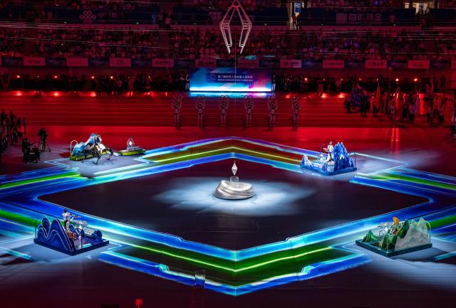 (260822) -- BEIJING, Aug. 22, 2026 (Xinhua) -- Humanoid robots perform during the opening ceremony of the 2nd World Humanoid Robot Games in Beijing, capital of China, Aug. 22, 2026. (Xinhua/Sun Fei)