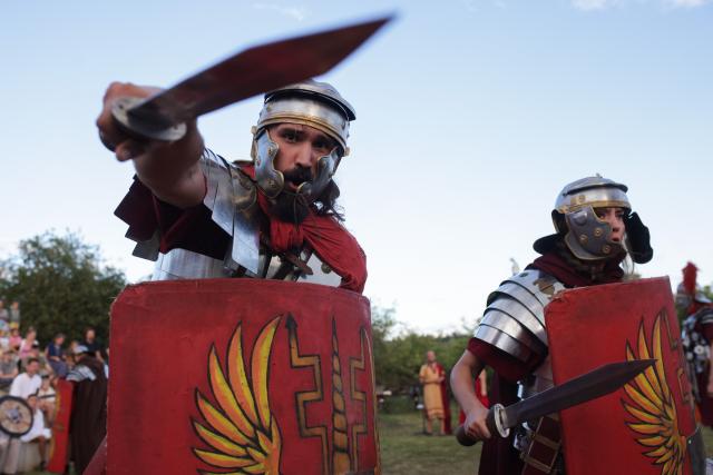 (260822) -- PTUJ, Aug. 22, 2026 (Xinhua) -- Participants dressed as Roman soldiers present military skills during the Roman Games Festival in Ptuj, Slovenia, Aug. 22, 2026. The 19th edition of the Roman Games festival kicked off on Friday in Ptuj and will last till Aug. 23. (Photo by Zeljko Stevanic/Xinhua)