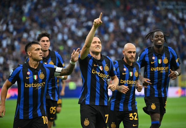 (260823) -- MILAN, Aug. 23, 2026 (Xinhua) -- Inter Milan's Piotr Zielinski (C) celebrates his goal during a Serie A football match between Inter Milan and Monza in Milan, Italy, Aug. 22, 2026. (Photo by Alberto Lingria/Xinhua)