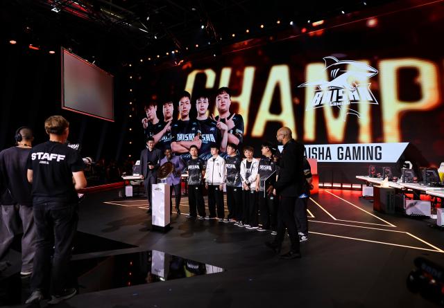 (260823) -- PARIS, Aug. 23, 2026 (Xinhua) -- Players of Baisha Gaming react after the grand final of Crossfire between Baisha Gaming of China and Team Liquid at the 2026 Esports World Cup in Paris, France, Aug. 22, 2026. (Xinhua/Wu Huiwo)