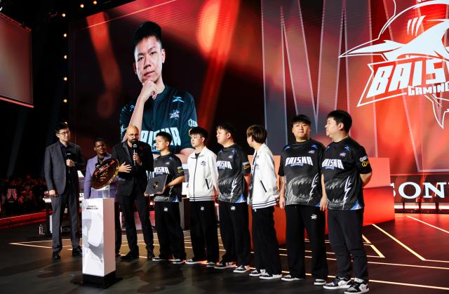 (260823) -- PARIS, Aug. 23, 2026 (Xinhua) -- Players of Baisha Gaming react after the grand final of Crossfire between Baisha Gaming of China and Team Liquid at the 2026 Esports World Cup in Paris, France, Aug. 22, 2026. (Xinhua/Wu Huiwo)