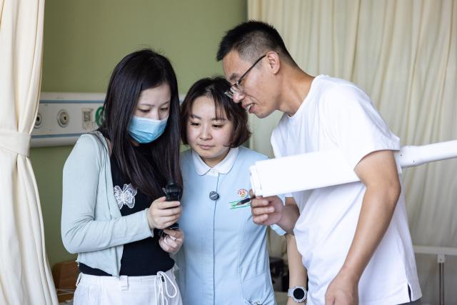 (260823) -- HUZHOU, Aug. 23, 2026 (Xinhua) -- Members of the production team check footage at the Shushan Healthcare Center in Huzhou City, east China's Zhejiang Province, Aug. 17, 2026.
  Senior residents at the Shushan Healthcare Center, an elderly care center in Huzhou, Zhejiang Province, sometimes misunderstand one another during daily conversations because of their advanced age. These moments inspired Shen Wanting, a post-95 nurse, and five colleagues of similar age to create micro dramas featuring these elderly residents and their daily lives at the center. 
  Five senior residents, whose average age is over 80, are regular cast members, and the oldest is over 90. 
  After gaining attention online, the production team has continued to release micro drama episodes. Since June 2025, they have produced over 160 episodes. (Photo by Yi Fan/Xinhua)