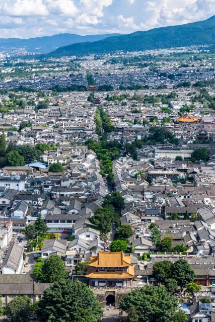 (260823) -- DALI, Aug. 23, 2026 (Xinhua) -- An aerial drone photo taken on Aug. 22, 2026 shows the scenery of the ancient town of Dali in Dali, southwest China's Yunnan Province. The ancient town of Dali has entered its peak tourism season during the summer holiday. According to the ancient town protection and management department, the ancient town recorded over 22 million tourist trips in the first seven months of 2026. (Xinhua/Hu Chao)