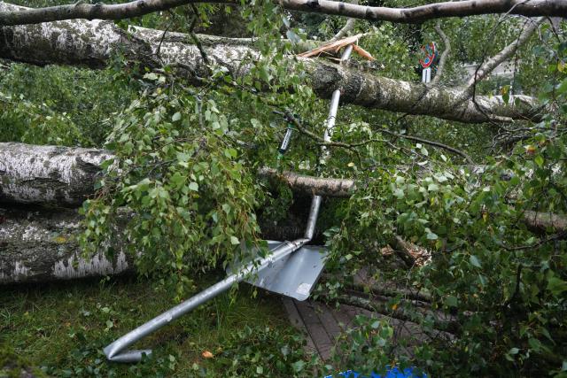 (260823) -- RIGA, Aug. 23, 2026 (Xinhua) -- This photo taken on Aug. 23, 2026 shows the aftermath of a powerful storm in Riga, Latvia. A powerful cyclone swept northward across the three Baltic states on Saturday, killing two as strong winds, torrential rain and thunderstorms ravaged Lithuania, Latvia and Estonia.
   Meteorological data showed Saturday's storm was the most destructive to hit Latvia since January 2005. (Photo by Edijs Palens/Xinhua)