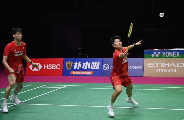 (260823) -- NEW DELHI, Aug. 23, 2026 (Xinhua) -- Feng Yanzhe/Huang Dongping (R) of China compete during the mixed doubles final match against Thom Gicquel/Delphine Delrue of France at BWF World Championships in New Delhi, India, Aug. 23, 2026. (Xinhua/Javed Dar)