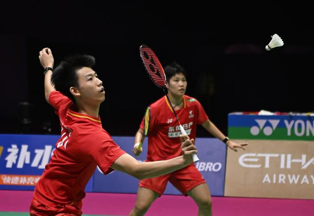 (260823) -- NEW DELHI, Aug. 23, 2026 (Xinhua) -- Feng Yanzhe (L)/Huang Dongping of China compete during the mixed doubles final match against Thom Gicquel/Delphine Delrue of France at BWF World Championships in New Delhi, India, Aug. 23, 2026. (Xinhua/Javed Dar)