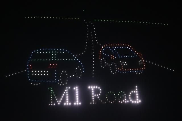 (260823) -- LILONGWE, Aug. 23, 2026 (Xinhua) -- Drones form an image featuring a China-aided road upgrade project during a 500-drone light show in Lilongwe, the capital of Malawi, Aug. 21, 2026. A spectacular 500-drone light show by Chinese tech experts illuminated the night sky over Lilongwe, the capital of Malawi, on Friday.
  TO GO WITH "500-drone light show held to celebrate China-Malawi people-to-people exchanges" (Photo by Kondwani Magombo/Xinhua)