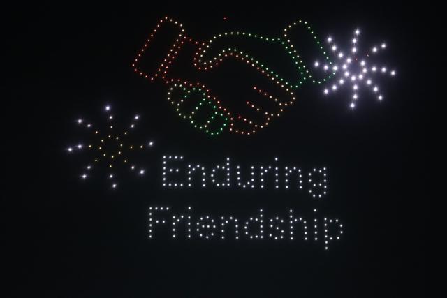 (260823) -- LILONGWE, Aug. 23, 2026 (Xinhua) -- Drones form an image featuring China-Malawi friendship during a 500-drone light show in Lilongwe, the capital of Malawi, Aug. 21, 2026. A spectacular 500-drone light show by Chinese tech experts illuminated the night sky over Lilongwe, the capital of Malawi, on Friday.
  TO GO WITH "500-drone light show held to celebrate China-Malawi people-to-people exchanges" (Photo by Kondwani Magombo/Xinhua)