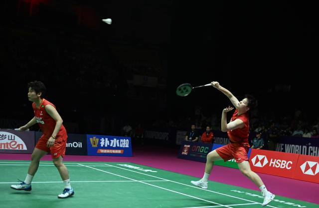 (260823) -- NEW DELHI, Aug. 23, 2026 (Xinhua) -- Tan Ning/Liu Shengshu (R) of China compete during the women's doubles final match against Baek Ha Na/Lee So Hee of South Korea at BWF World Championships in New Delhi, India, Aug. 23, 2026. (Xinhua/Javed Dar)