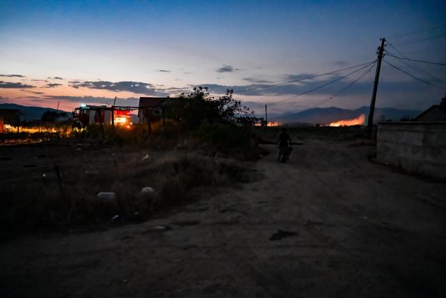 (260823) -- STRUMICA, Aug. 23, 2026 (Xinhua) -- This photo taken on Aug. 22, 2026 shows a spreading wildfire fueled by weeks of extreme summer heat and dry vegetation in Strumica, North Macedonia. (Photo by Tomislav Georgiev/Xinhua)