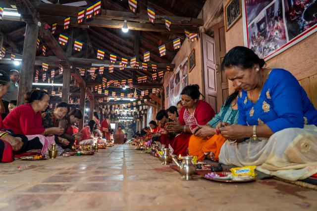 (260823) -- LALITPUR, Aug. 23, 2026 (Xinhua) -- Devotees prepare small stupas in celebration of the Gunla Festival in Lalitpur, Nepal, Aug. 23, 2026. The month-long Gunla Festival is one of the major festivals of the Newar Buddhist community, during which they recite scriptures, observe fast and visit places of worship. (Photo by Hari Maharjan/Xinhua)