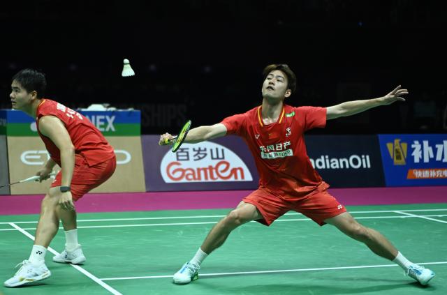 (260823) -- NEW DELHI, Aug. 23, 2026 (Xinhua) -- Wang Chang (R)/Liang Weikeng of China compete during the men's doubles final between Wang Chang/Liang Weikeng of China and Aaron Chia/Soh Wooi Yik of Malaysia at BWF World Championships in New Delhi, Aug. 23, 2026. (Xinhua/Javed Dar)