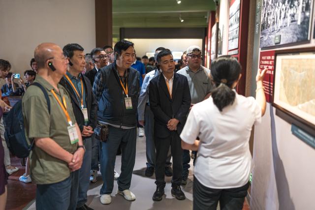 (260823) -- KUNMING, Aug. 23, 2026 (Xinhua) -- Members of a Macao media delegation visit the Historical Museum of Yunnan Military Academy in Kunming, southwest China's Yunnan Province, Aug. 22, 2026.
  The Macao media delegation is on a visit to Kunming, Dali, and Lijiang in Yunnan Province from Aug. 21 to 27. The visit aims to strengthen exchanges and cooperation between Yunnan and Macao media. (Xinhua/Wang Guansen)